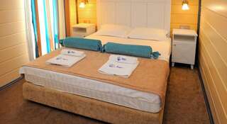 Гостиница Рига Щёлкино  Стандартный двухместный номер с 1 кроватью или 2 отдельными кроватями-58